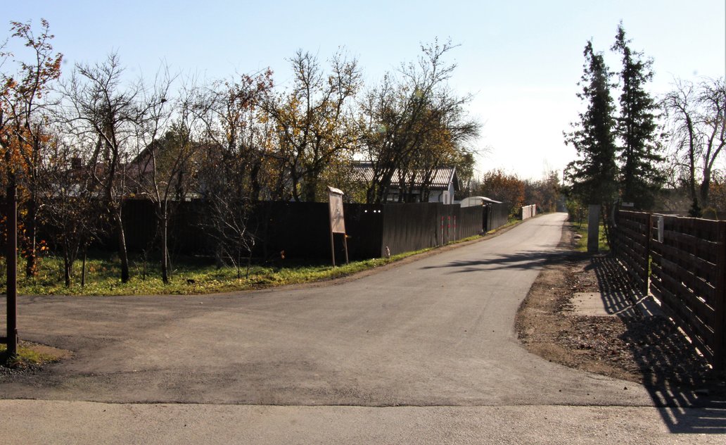 Naujas asfaltas dar vienoje sodų gatvėje 